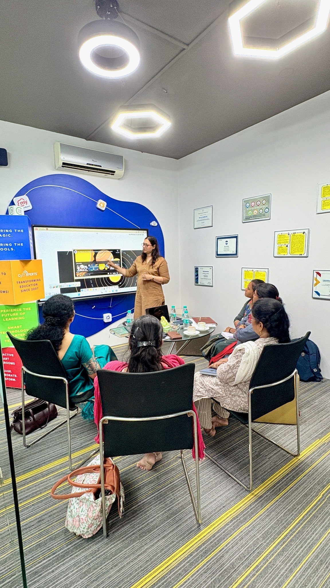 A C3 iT Xperts trainer demonstrating interactive teaching practice to educators