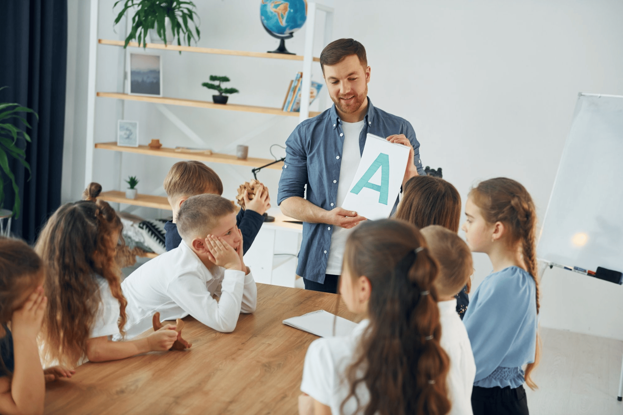showing-a-letter-group-of-childr