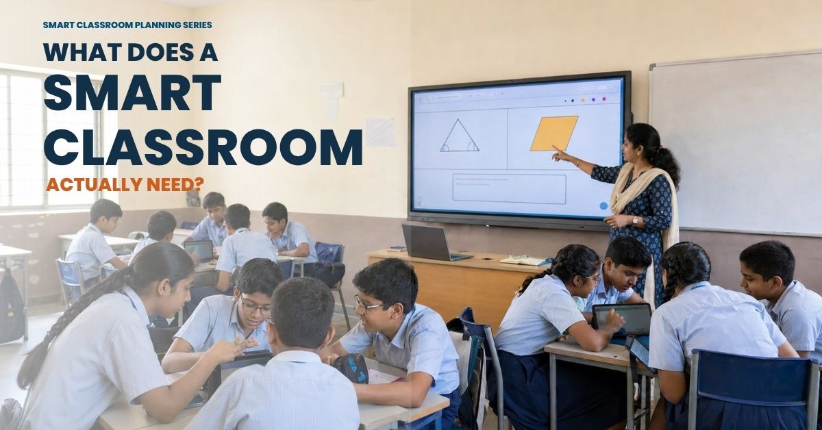 Indian teacher using an interactive flat panel while students collaborate using shared tablets in a smart classroom